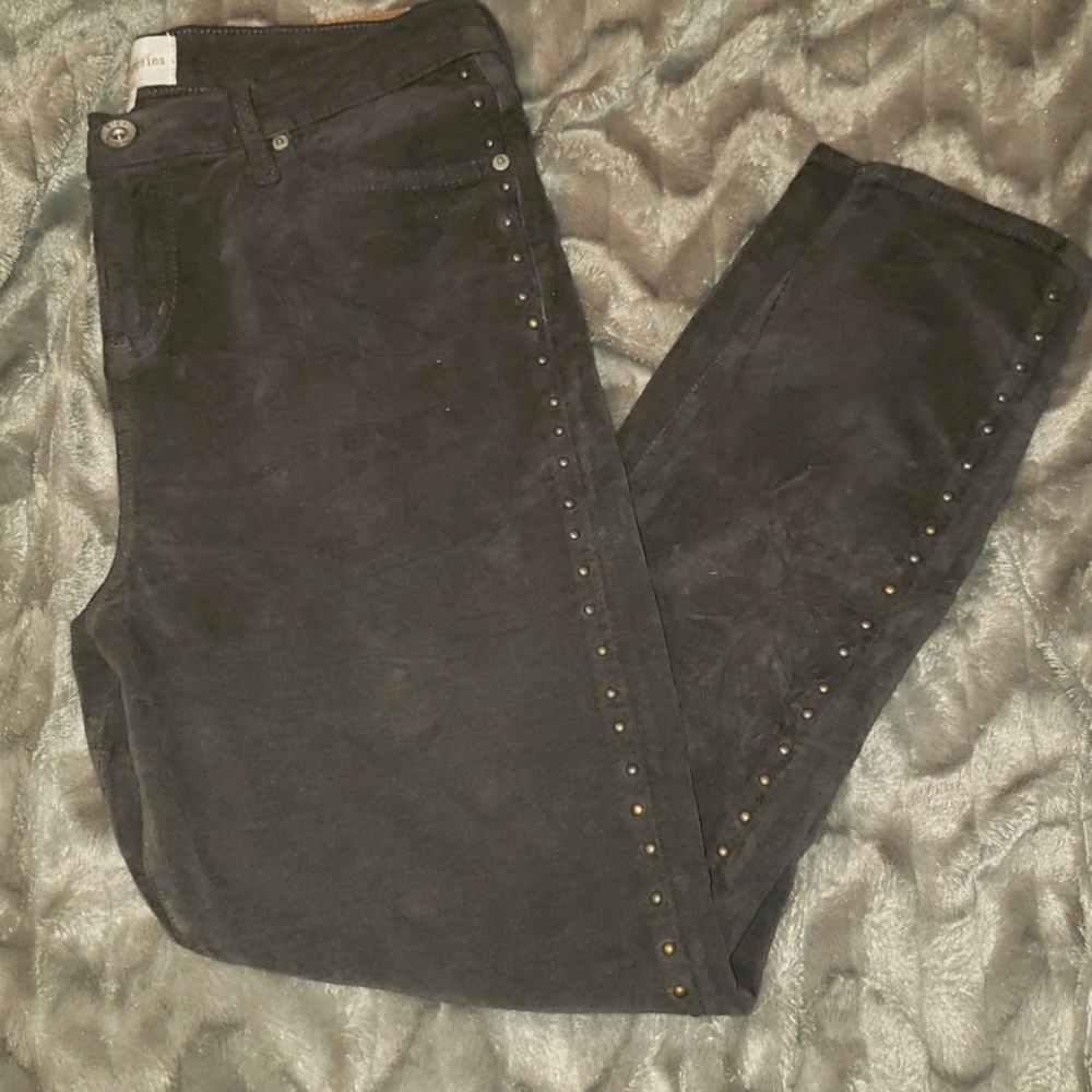 Brown velvet-like pants with brushed gold studs